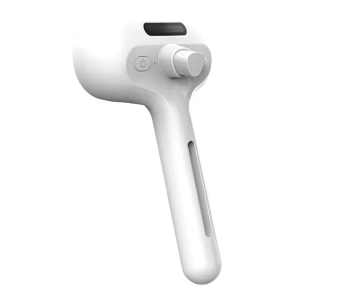 3-i-1 steam grooming brush