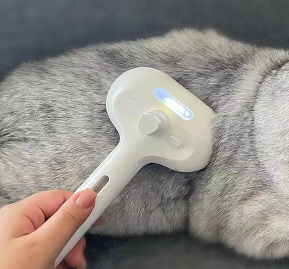 3-i-1 steam grooming brush